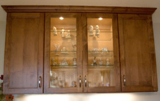 Custom-built wall-mounted display case in Dining Room