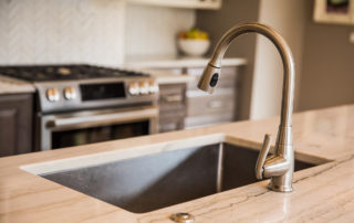 Faucet detail in handsome countertop