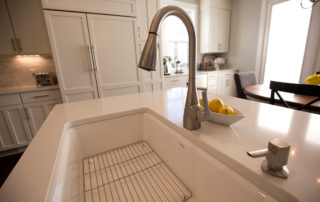 Faucet, under-mount sink, cabinetry