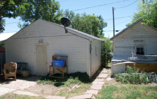 The old garage and shed where the ADU will go..