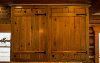 Beetle Kill Pine custom cabinets in Boulder log cabin